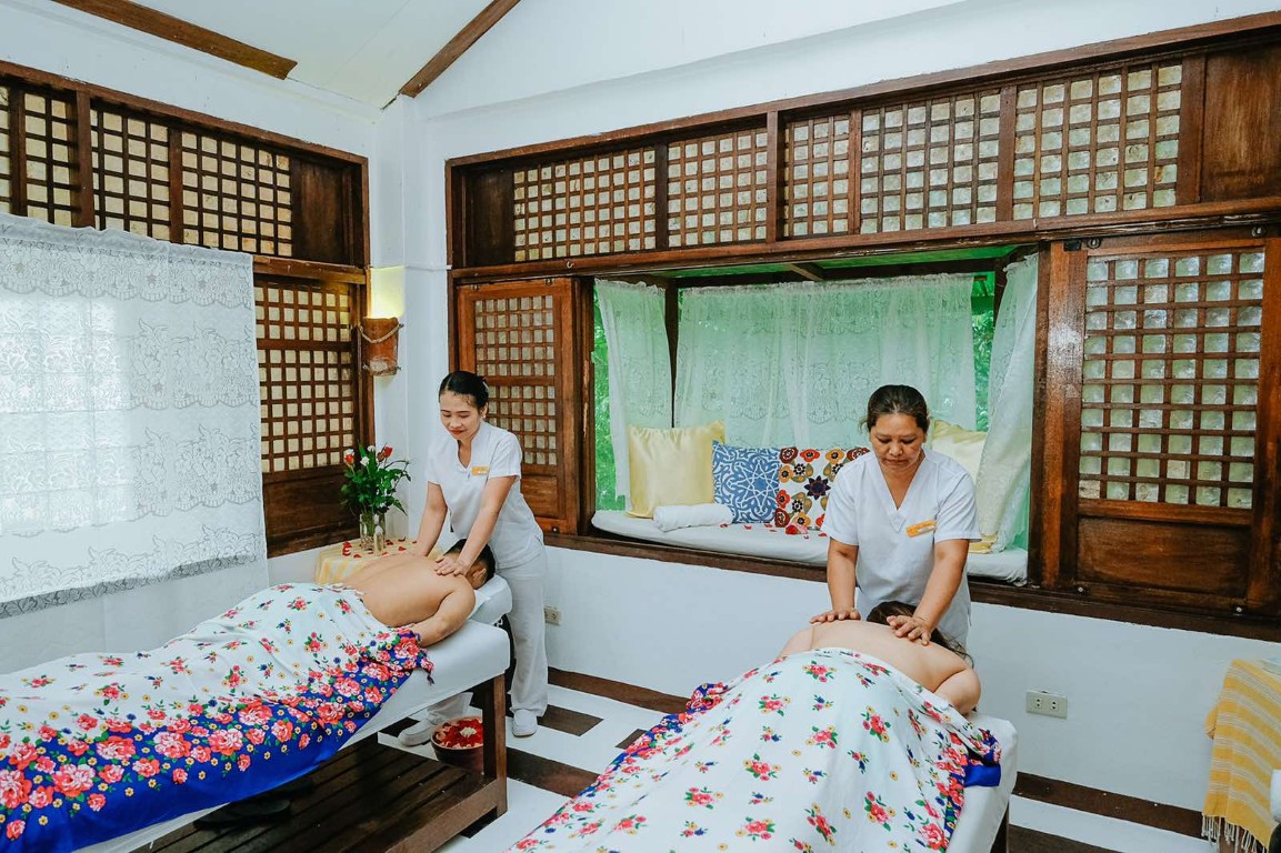 couples at a massage in sonya's garden spa
